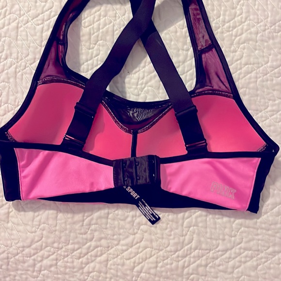 Victoria Secret Sports Bra size small and medium but both fit about the same. - Picture 4 of 6